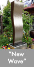 Thumbnail image of a large bronze and stainless steel water feature.